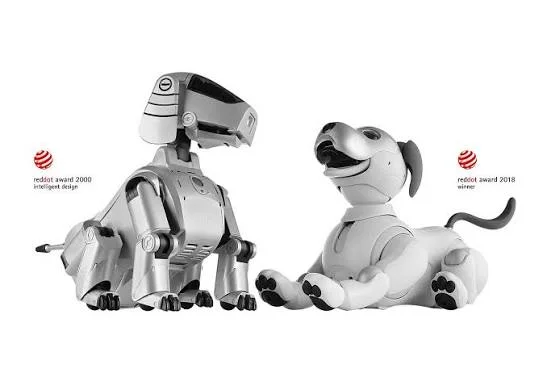 Two robot dogs of different designs facing each other on a white background