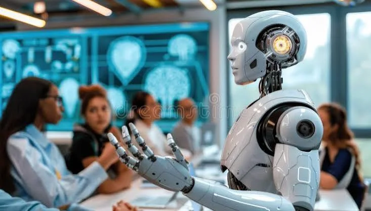 Humanoid robot gesturing toward students in a classroom with a digital display behind it